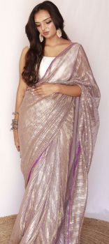 Pink and Majenta colour Saree in Net fabric with Foil Print work